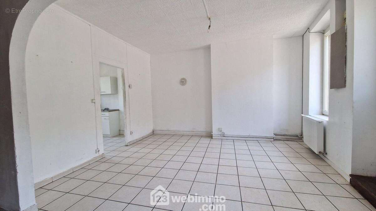 Un séjour lumineux de 21 m² - Maison à LAON