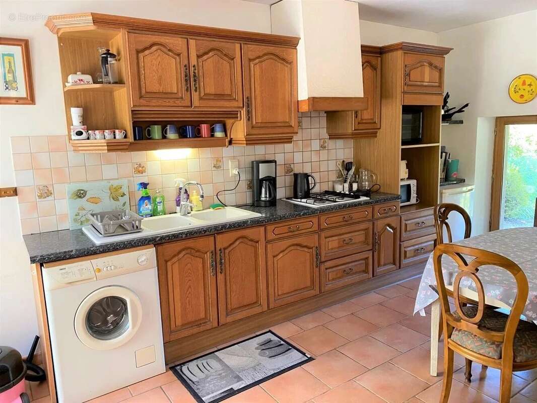 Maison à FRAYSSINET-LE-GELAT