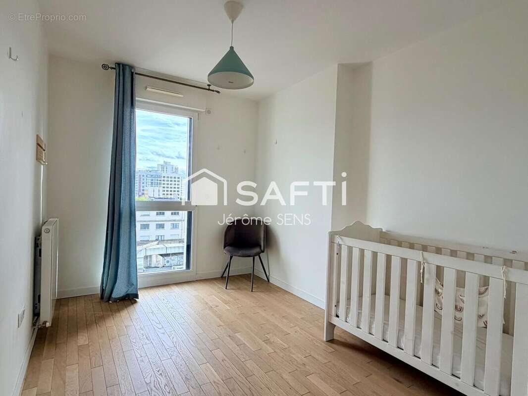Photo 9 - Appartement à COURBEVOIE