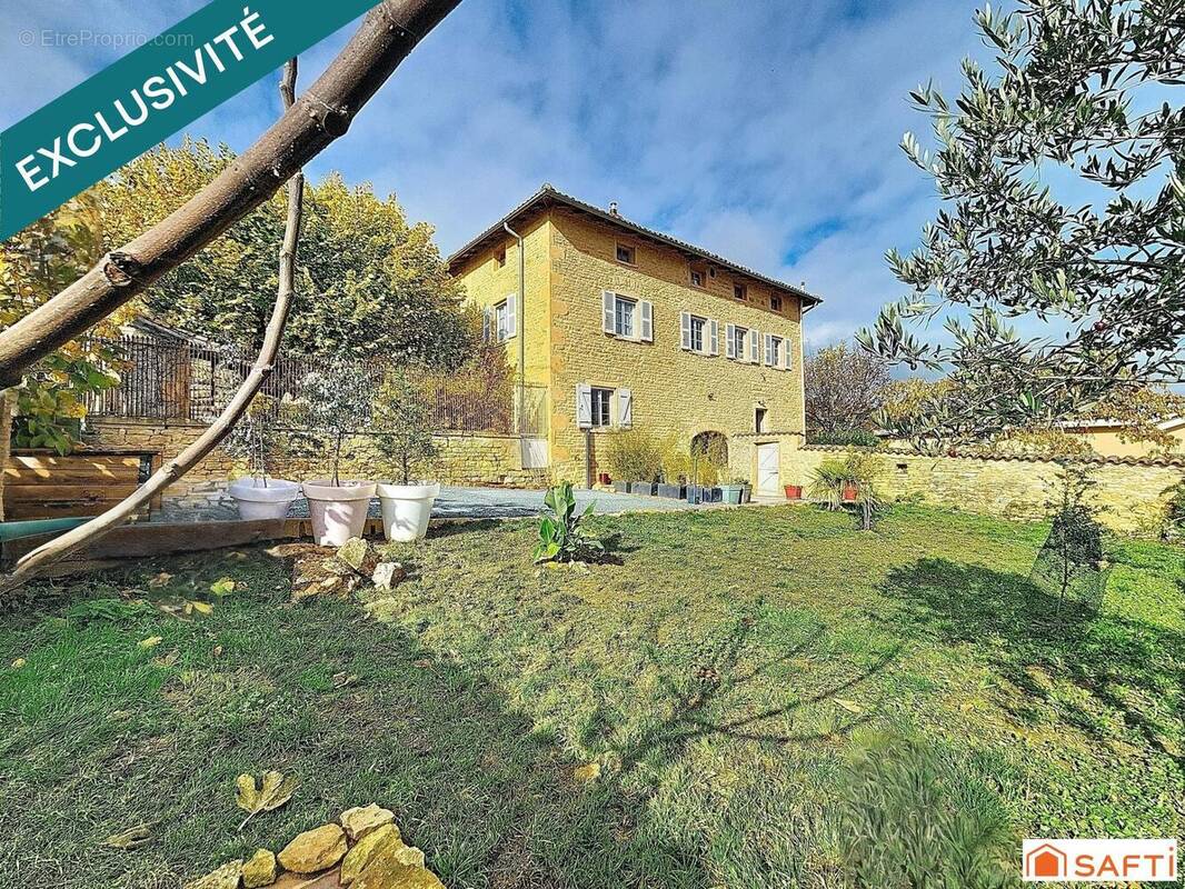 Photo 1 - Maison à THEIZE