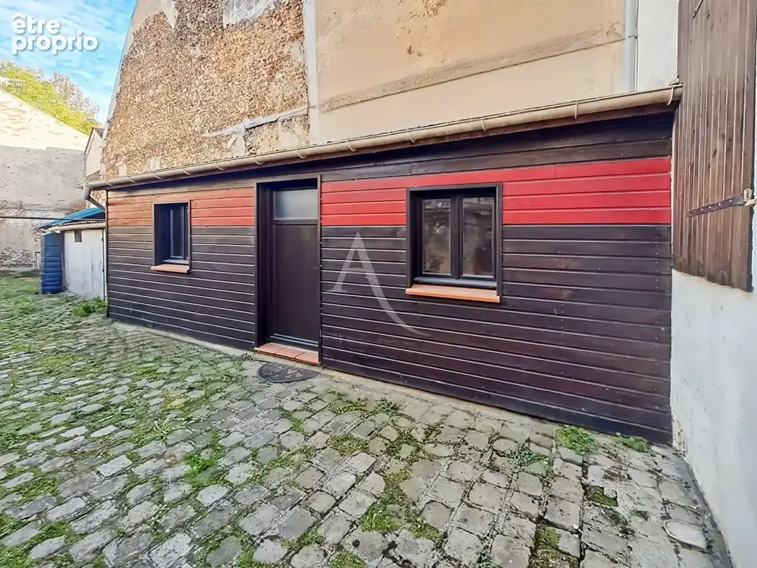 Appartement de charme au RDC de 47 m² avec dépendance et cave voûtée rénovée - Centre-ville d'Arpajon - photo 6