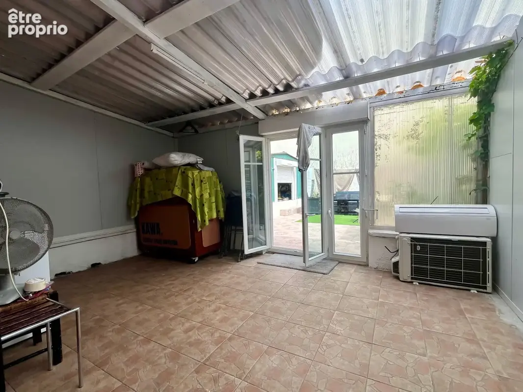 BOBIGNY - LES CASTORS : Superbe pavillon familial avec véranda et jardin - photo 8
