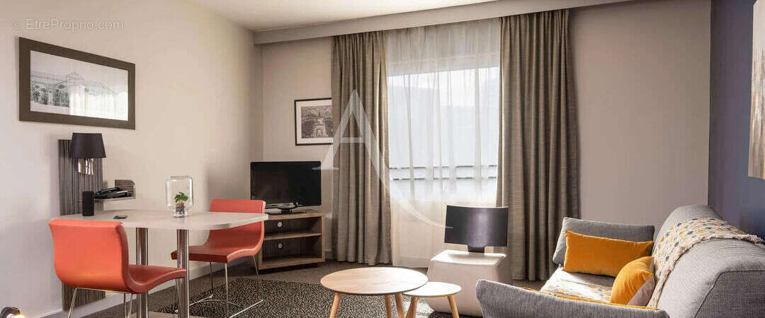 A vendre pour investissement lmnp residence affaires: appartement 3 pièces de 54.02 m2 situé à puteaux - photo 2