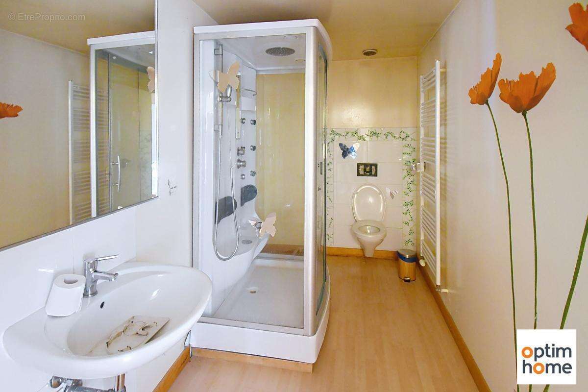 Maison de village 150m2 - 4 chambres - garage - terrain 356m2 - photo 7