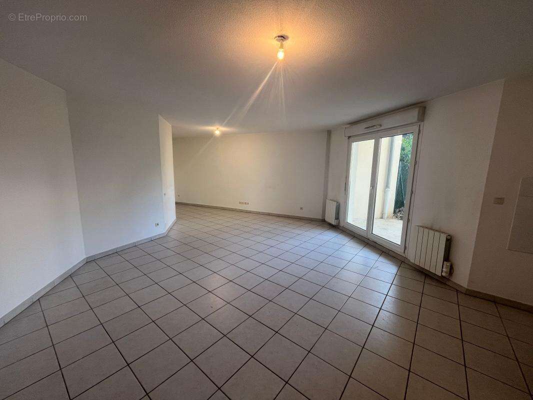 Appartement T4 de 86 m² en rez-de-jardin – Centre de Pont-de-Chéruy - photo 7
