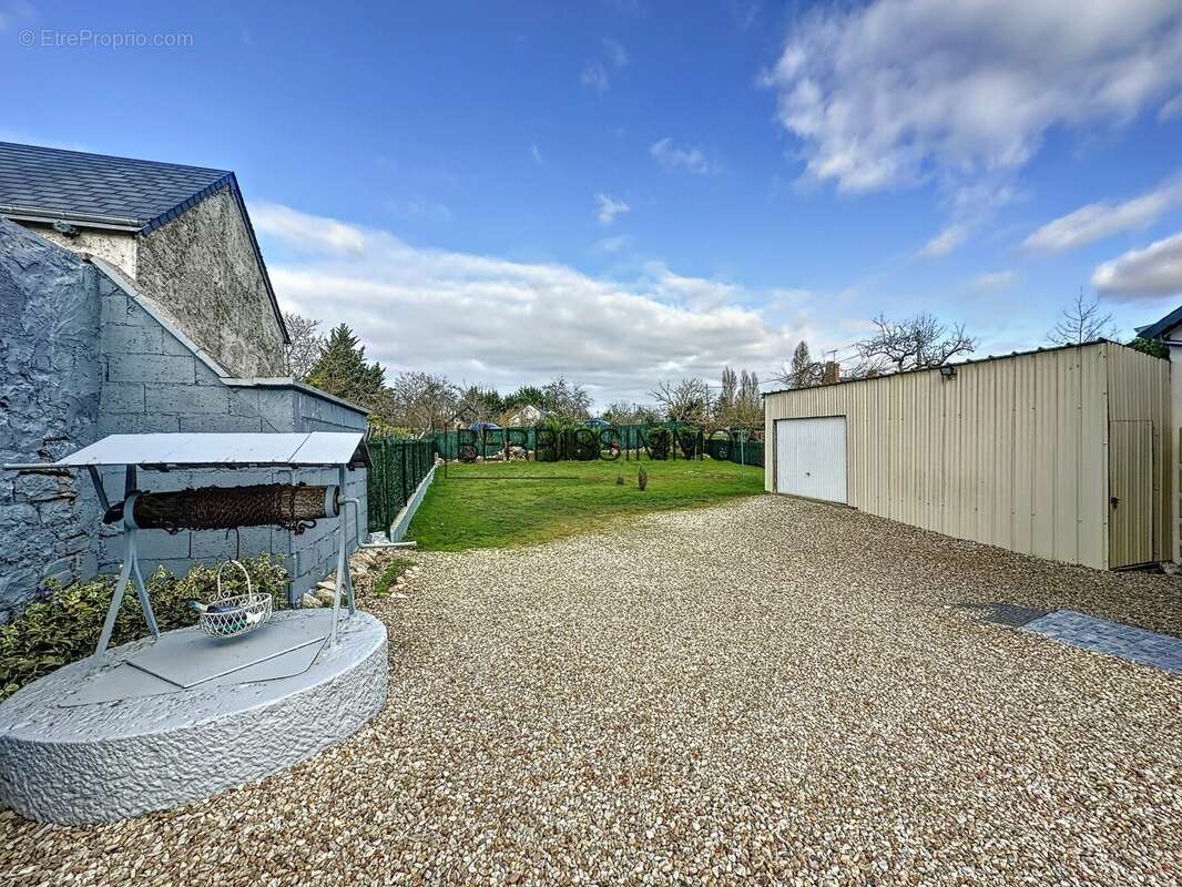 Maison à Pruniers, le jardin - Maison à PRUNIERS