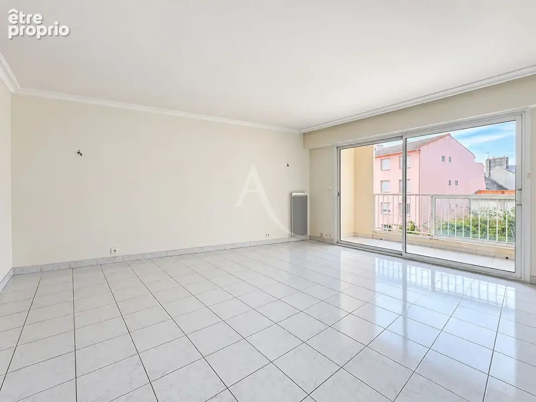 Appartement T3  en centre-ville avec garage - photo 2
