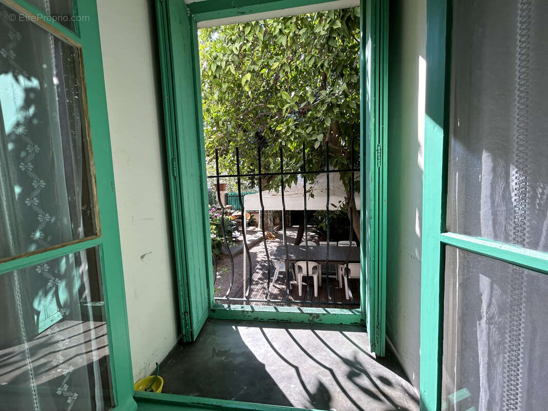 Bâtisse au cœur du village - photo 8