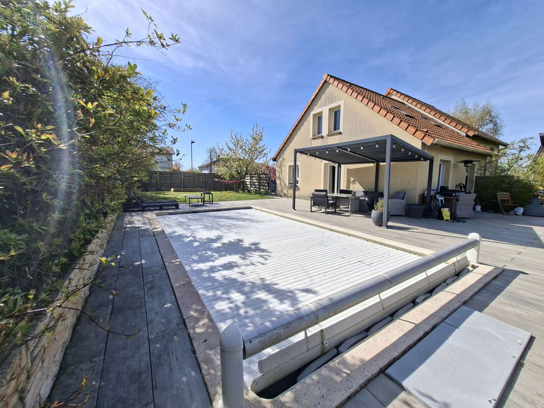 Maison à LOUVIGNY