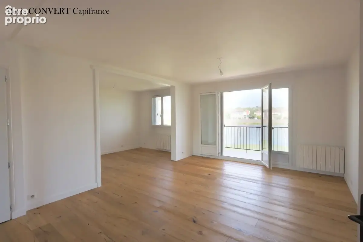 Appartement d'exception 99m² avec garage vue panoramique à SAINT LAURENT SUR SAONE (01) - photo 5