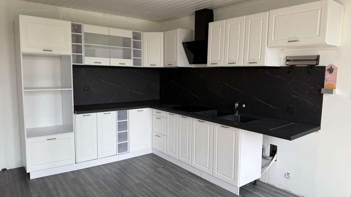 Maison 96 m² à Ascoux  - photo 4