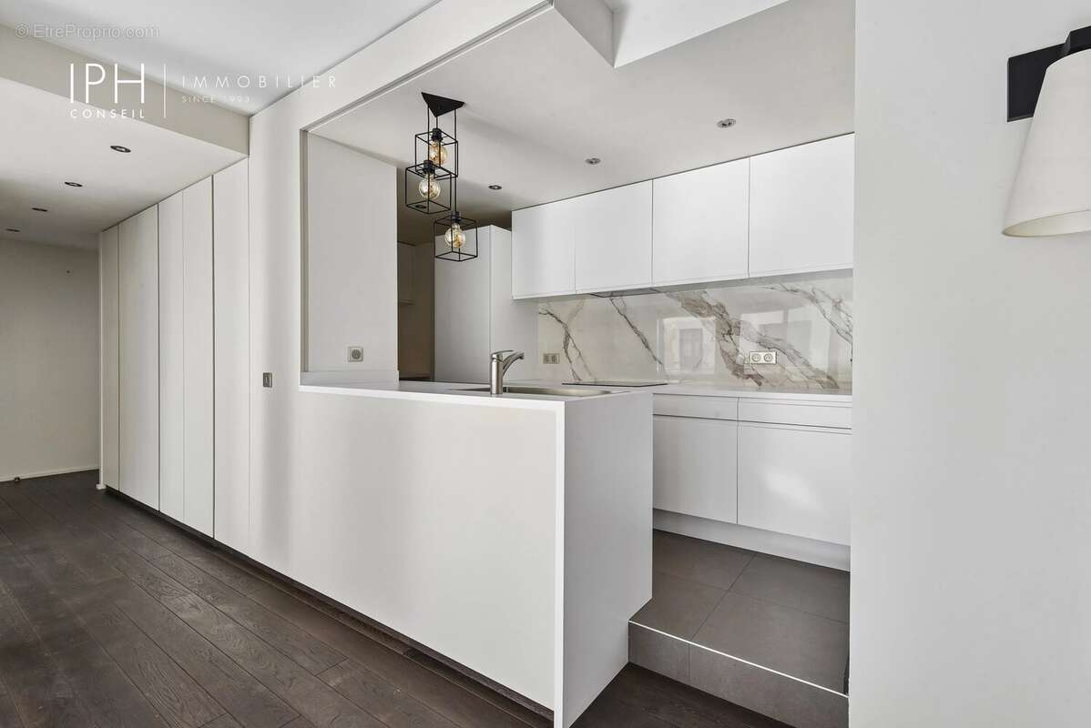 Appartement rénové, lumineux et proche commodités - photo 8