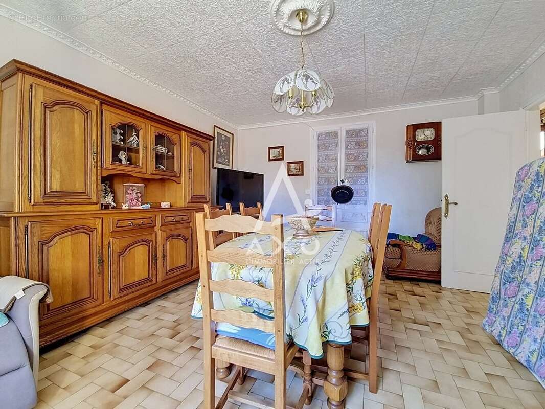 Maison en brique à Auneuil avec 2 chambres, véranda et jardin clos - photo 6