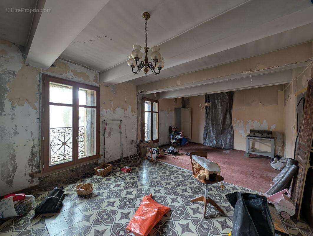 Maison de ville de caractère à fort potentiel - photo 12