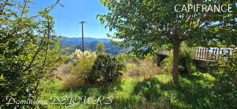 Maison à SAINT-MICHEL-DE-CHABRILLANOUX