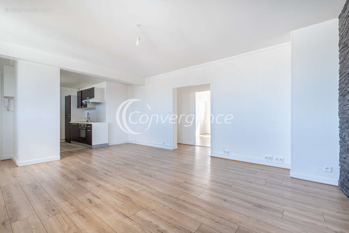 Appartement T4 rénové avec 3 chambres et ascenseur - photo 3