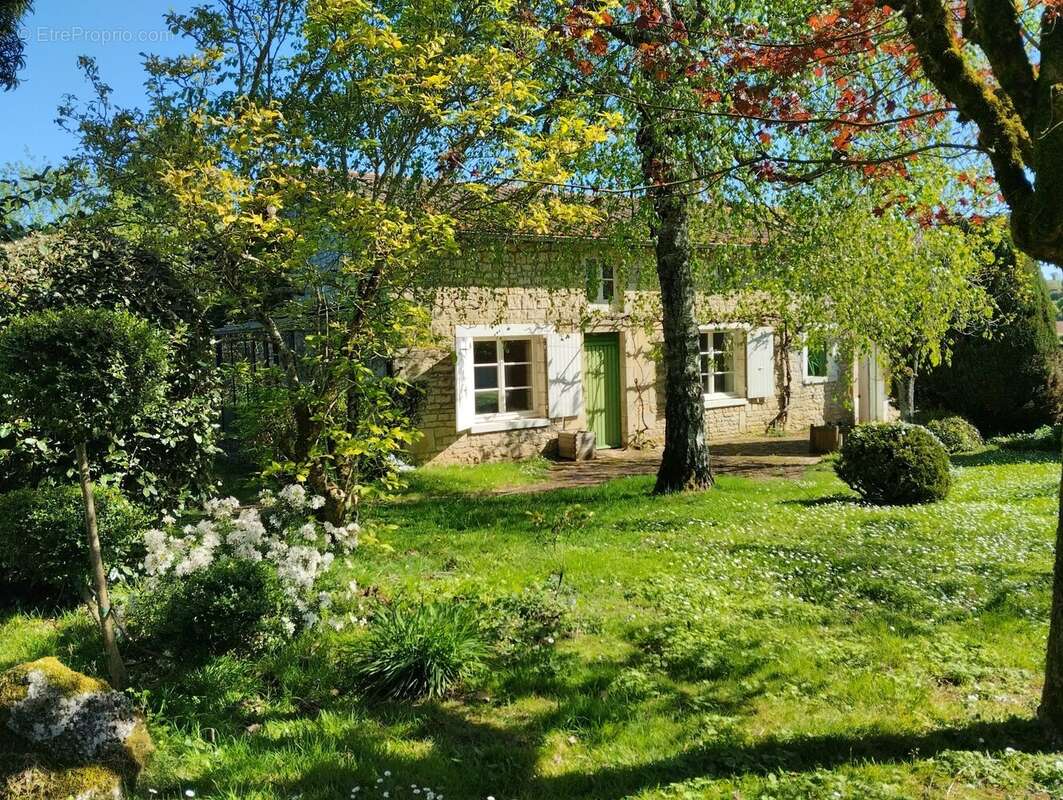 Maison à AUBIGNE