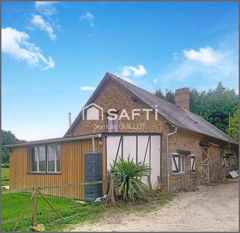 Photo 2 - Maison à SAINTE-MARIE-DU-BOIS