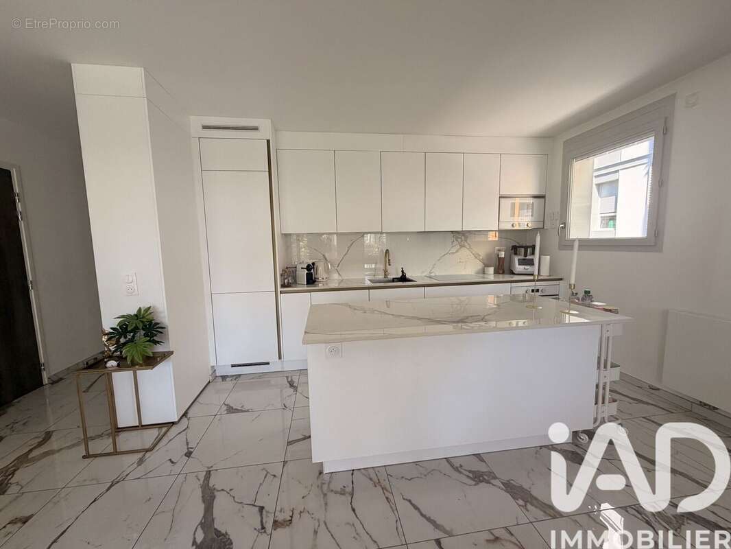 Appartement 82 m² à Saint-Genis-Pouilly  - photo 3