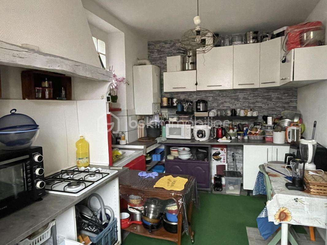 Immeuble composé de 3 appartements avec une très belle rentabilité locative de plus de 12% ! - photo 9