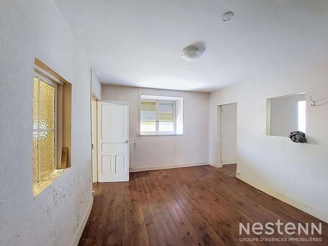 A Vendre Maison en pierre de 118m² avec quatre pièces et terrasse couverte à Condom - photo 10