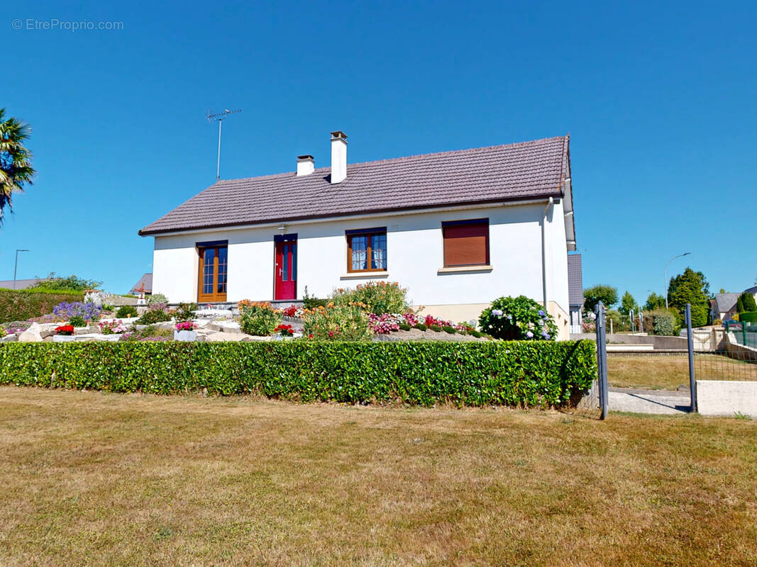 Pavillon de 90m2 habitables sur terrain de 699m2 avec sous-sol complet. - photo 1