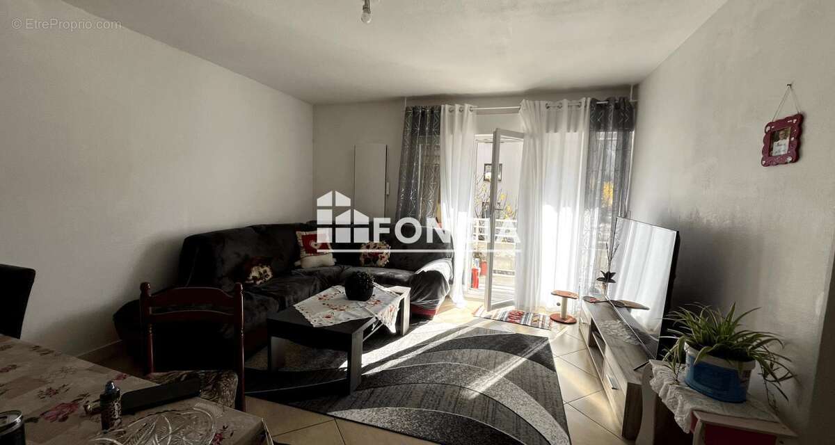 Appartement T4 avec 2 balcons et parking, vendu loué - photo 3