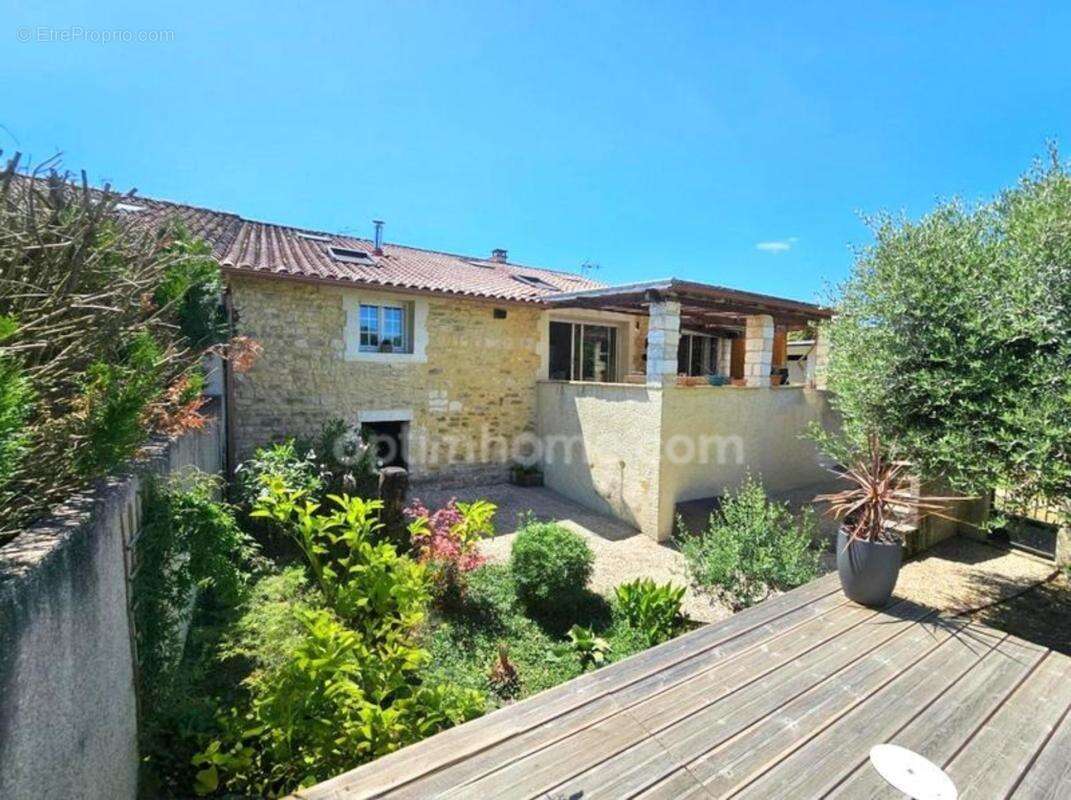 Maison en pierre atypique de 122 m² 3 chambres et 1 bureau – Coup de cœur assuré à MAGNAC SUR TOUVRE (16) - photo 7