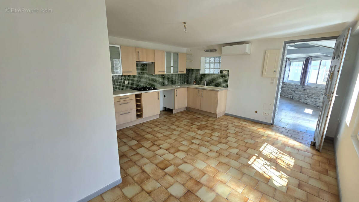 Appartement rdc t2 56m2 carrez + terrasse + parking exterieur - photo 6