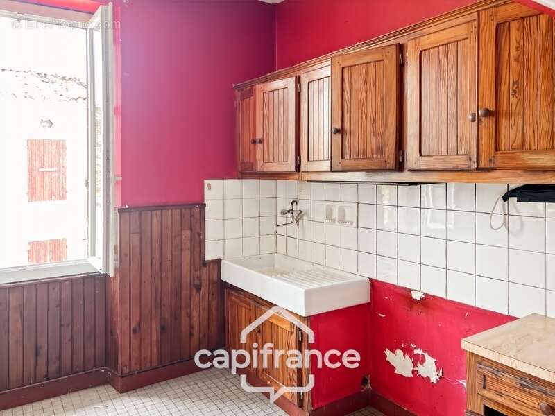 Maison à renover avec fort potentiel, cour et garage - photo 2