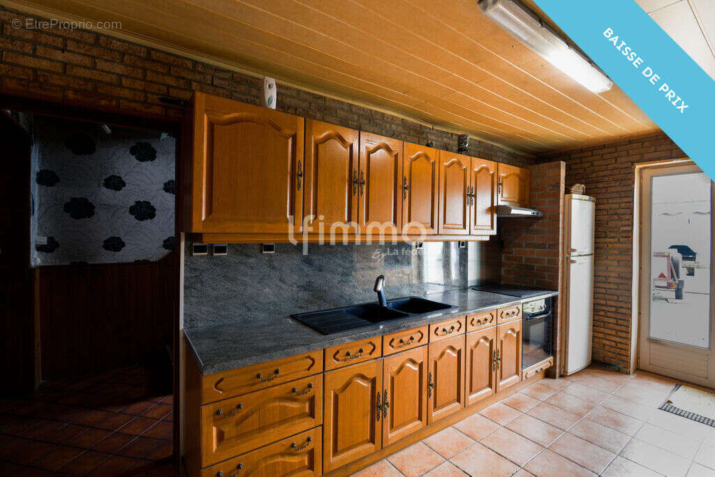 Maison à QUIEVRECHAIN