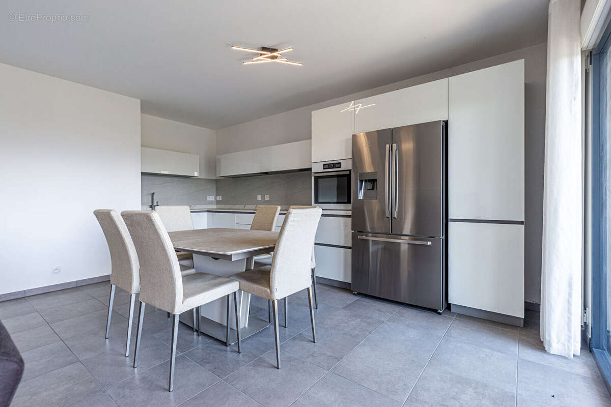 Agence immobiliere laforet - exclusivite - "lotus" - annecy - appartement traversant t4 de 81,93m² - cellier - garage en option  - photo 4