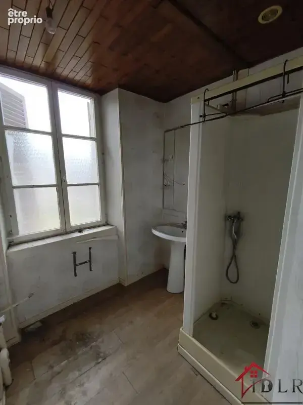 Immeuble de rapport mixte 4 appartements + 2 locaux fort pot - photo 13