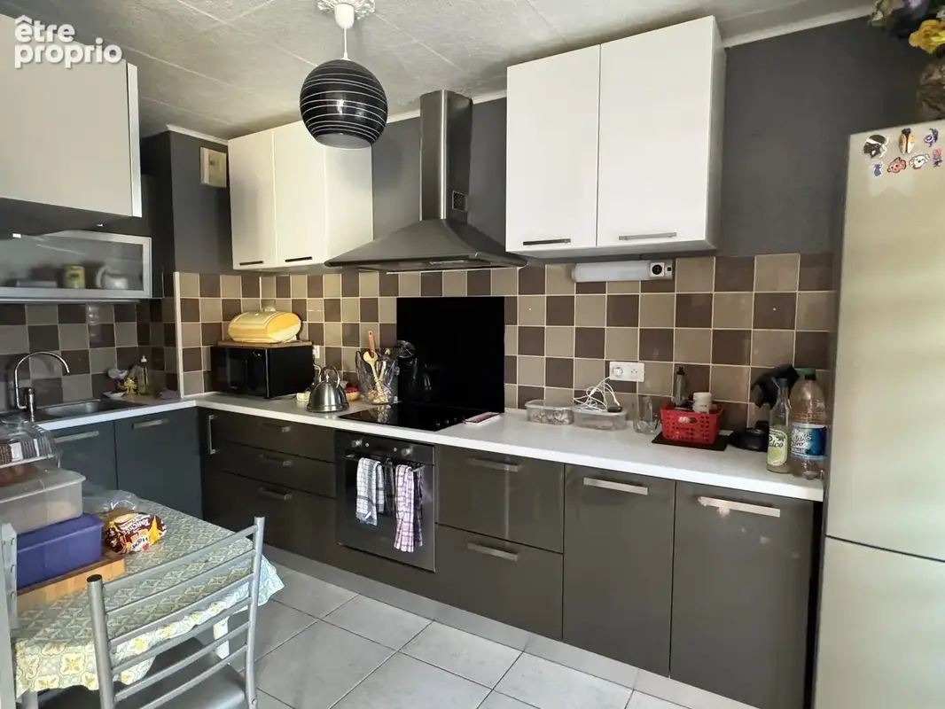 Appartement T3 en rez-de-chaussée proche des commerces - photo 3