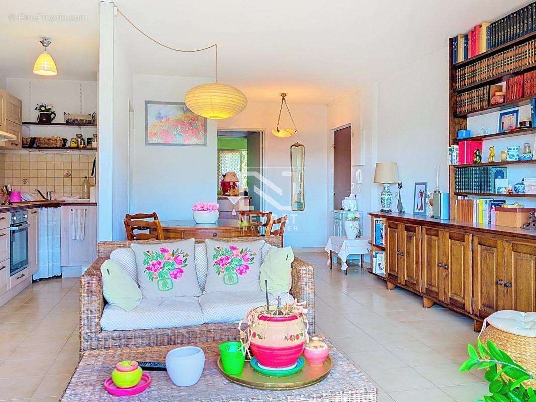 Appartement traversant lumineux 2 chambres terrasse parking sous sol - photo 2