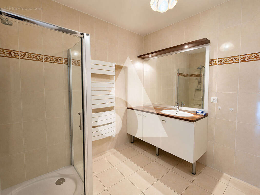 Appartement SAINTE GENEVIEVE DES 3 pièces 79.35m² - photo 7