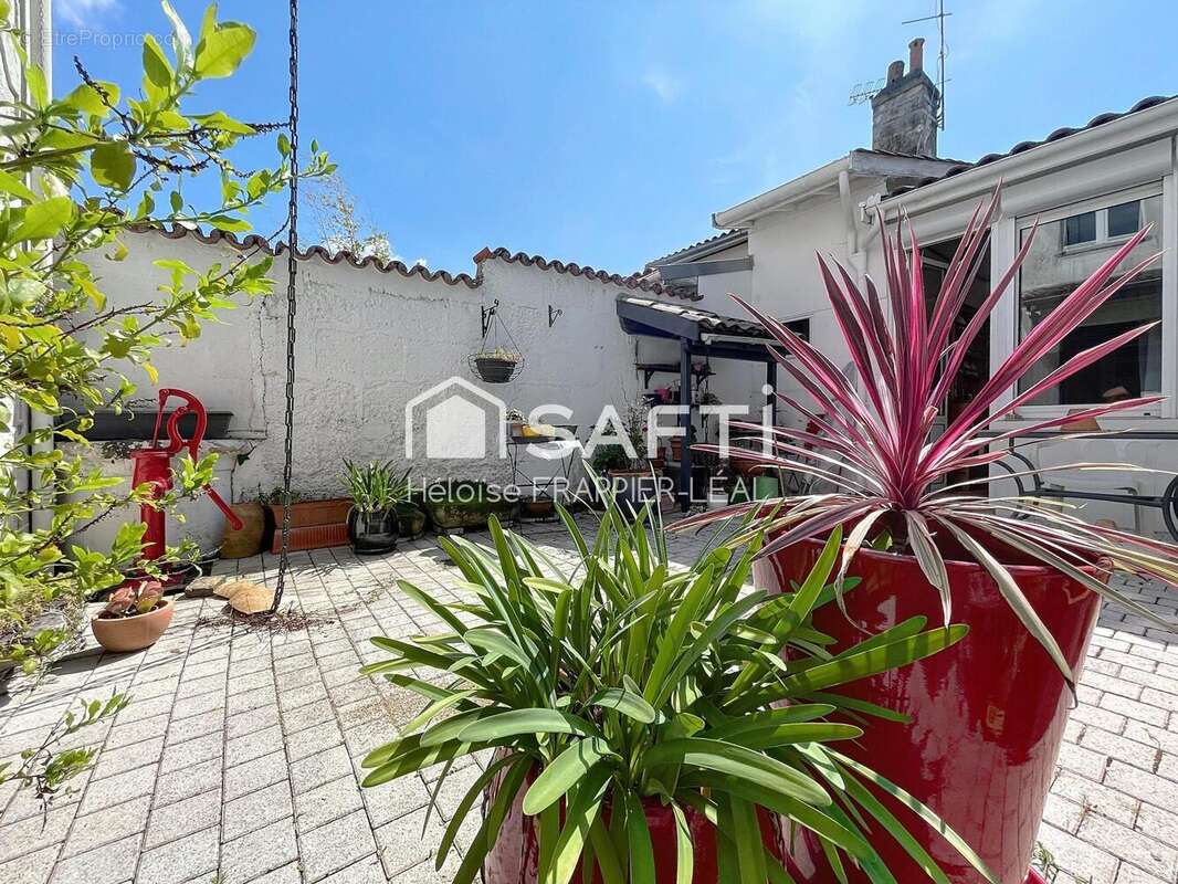 Photo 2 - Maison à LE BOUSCAT