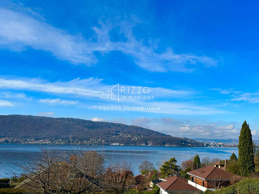 Appartement refait à neuf avec grande terrasse vue lac !!! - photo 15