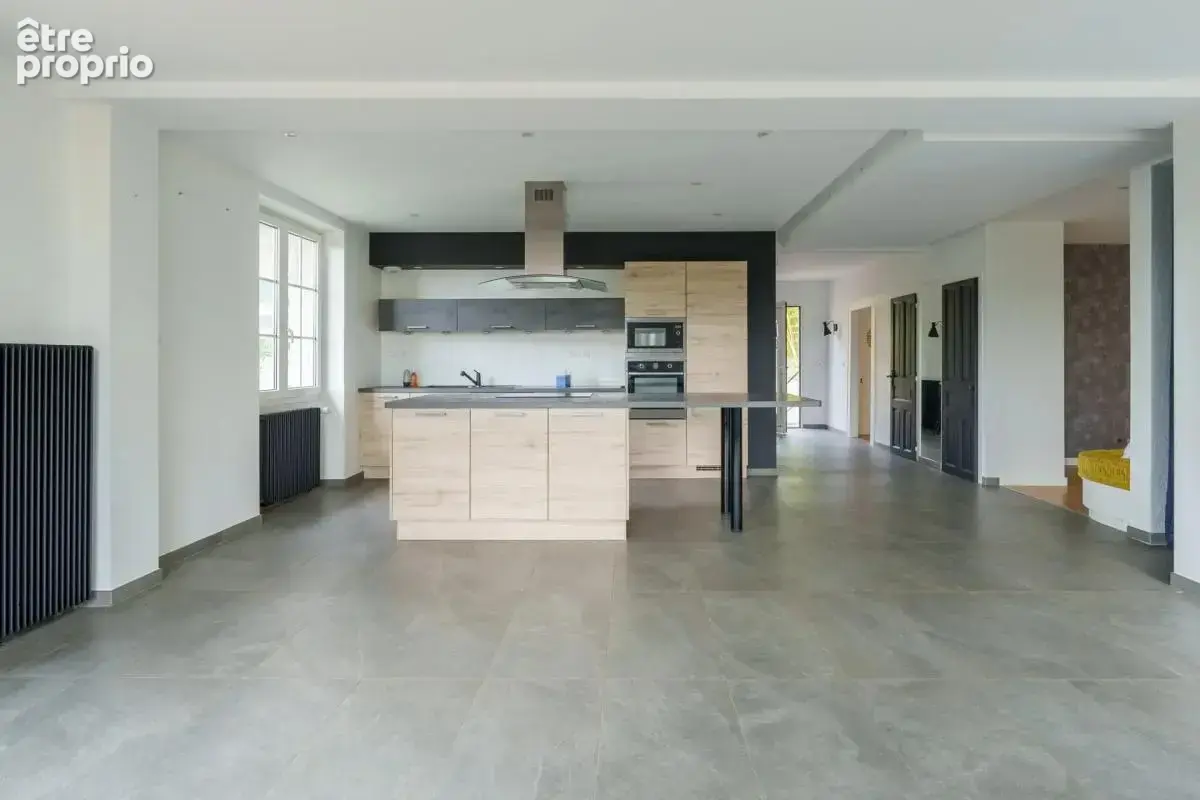 Vesoul – une maison familiale aux volumes exceptionnels - photo 4
