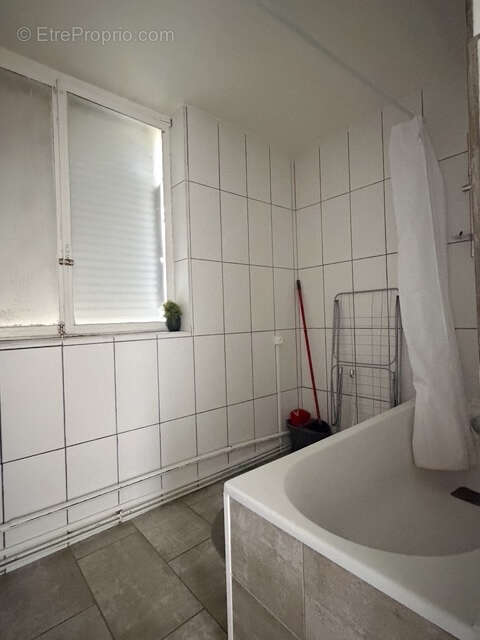 F3 de 58 m2 au 2ᵉ étage   Cuisine ouverte US semi-équipée   2 chambres - photo 10