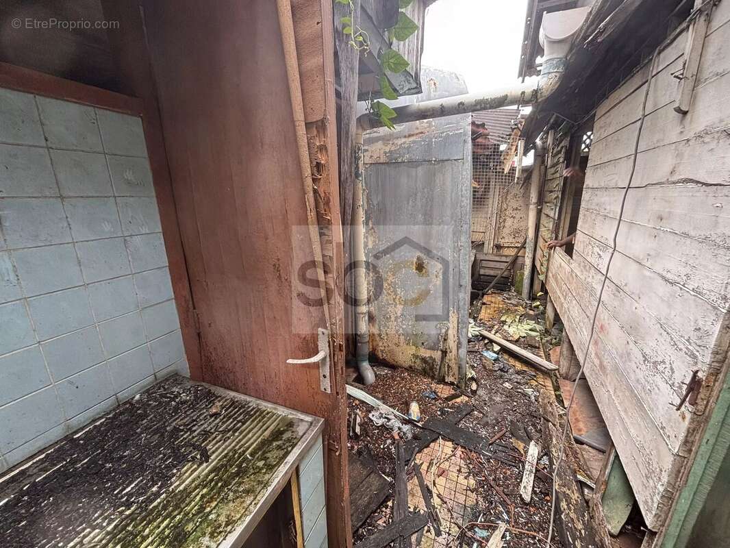 Cayenne centre-ville - Terrain bâti 80 m² zone UA1 — Potentiel R+3/R+4 — Idéal investisseur - photo 7