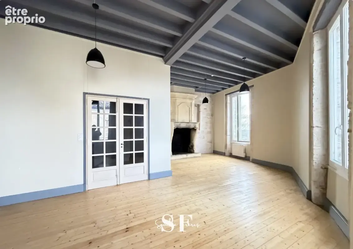 Rive gauche, immeuble de caractere appartement et local commercial - photo 6