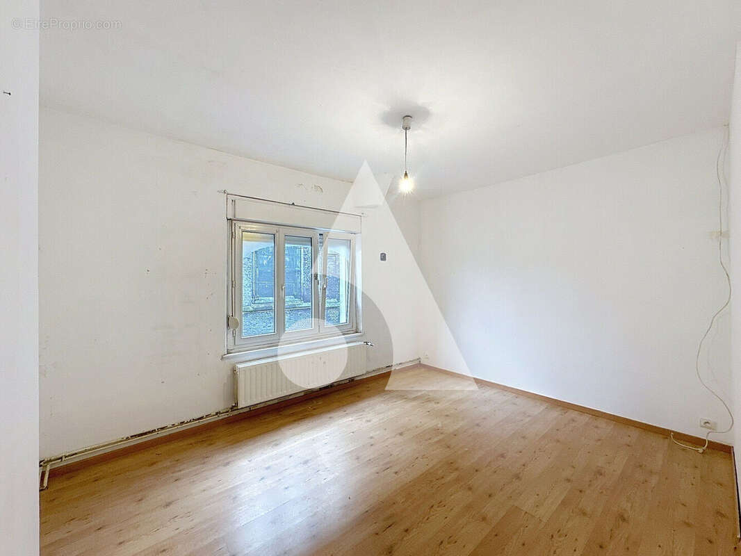 Maison à FRESNES-SUR-ESCAUT