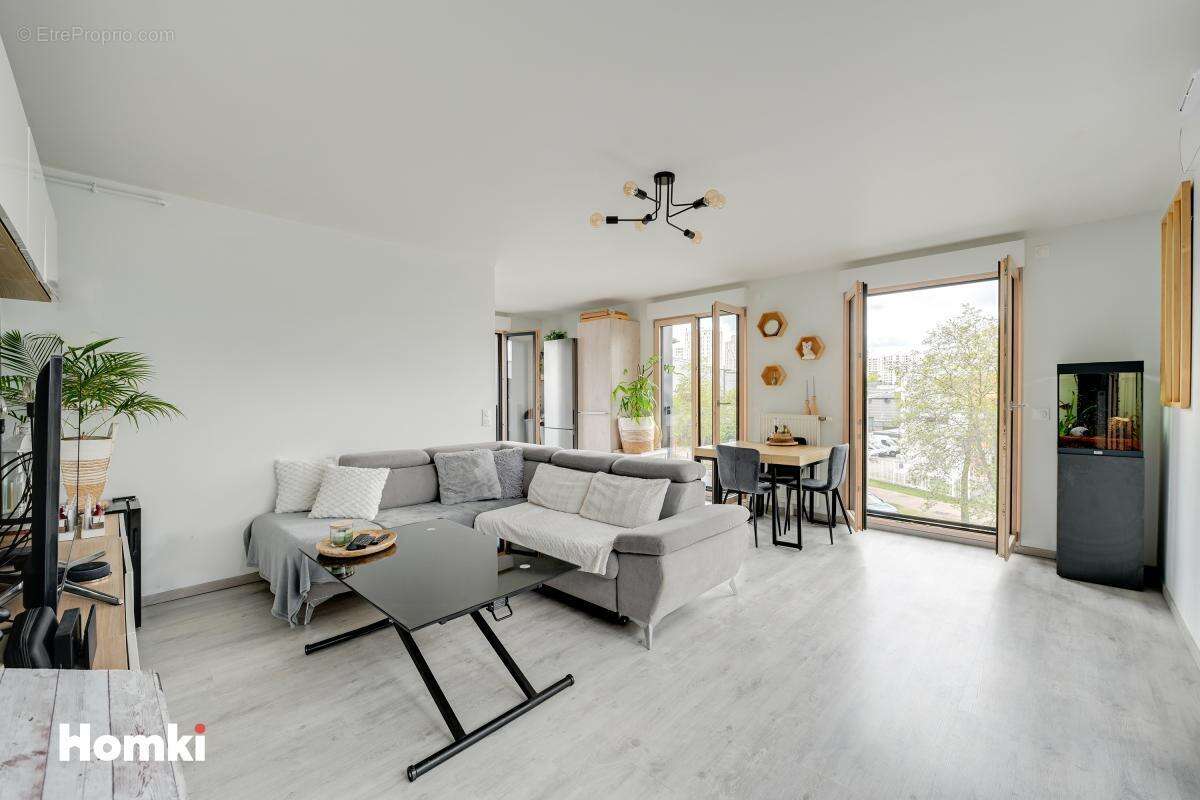 Nanterre Ville –T3 avec terrasse au dernier étage - photo 3