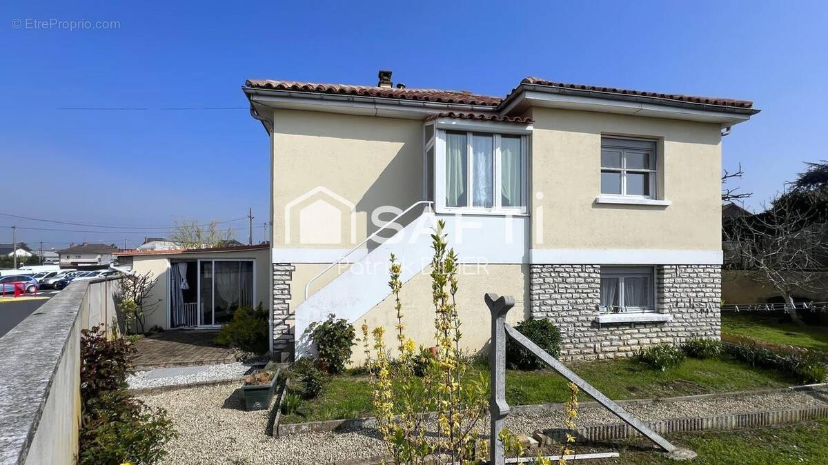 Photo 1 - Maison à THOUARS