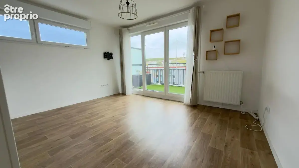 Immeuble de standing F2 avec extérieur et parking - photo 2