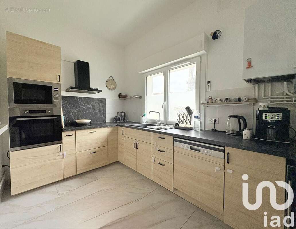 Photo 2 - Maison à FEROLLES-ATTILLY