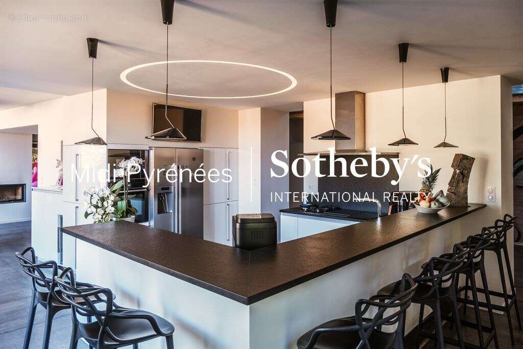 Belle allure pour cette propriété avec deux habitations - photo 11