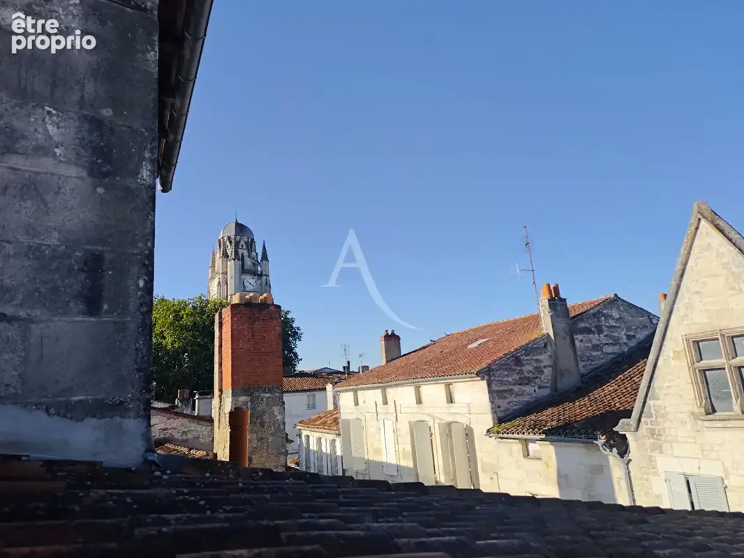 Appartement atypique au coeur du centre historique avec stationnement privatif - photo 18
