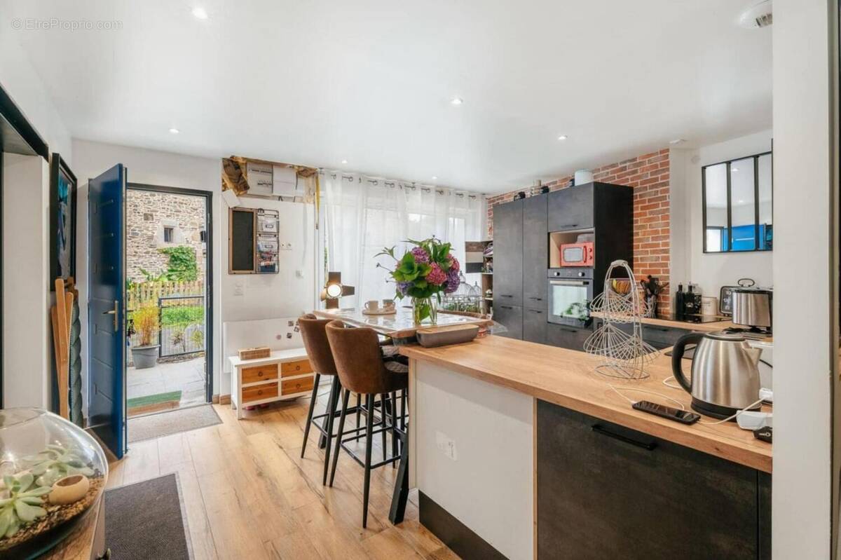 Photo 1 - Maison à BAGUER-PICAN